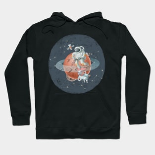 Spaceman riding scooter on Saturn Hoodie